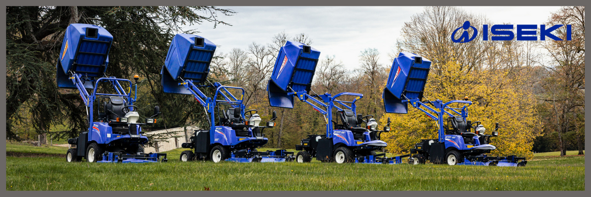 Plusieurs machines d'espaces verts et de transport Iseki dans un parc